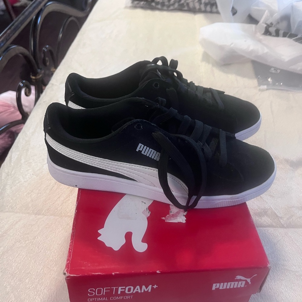 Puma sneakers.
